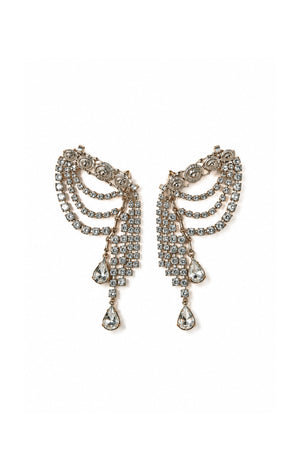 A pair of ornate DYLANLEX silver-tone dangle earrings adorned with clear rhinestones, featuring curved layered bands and teardrop-shaped drops, set against a plain white background.